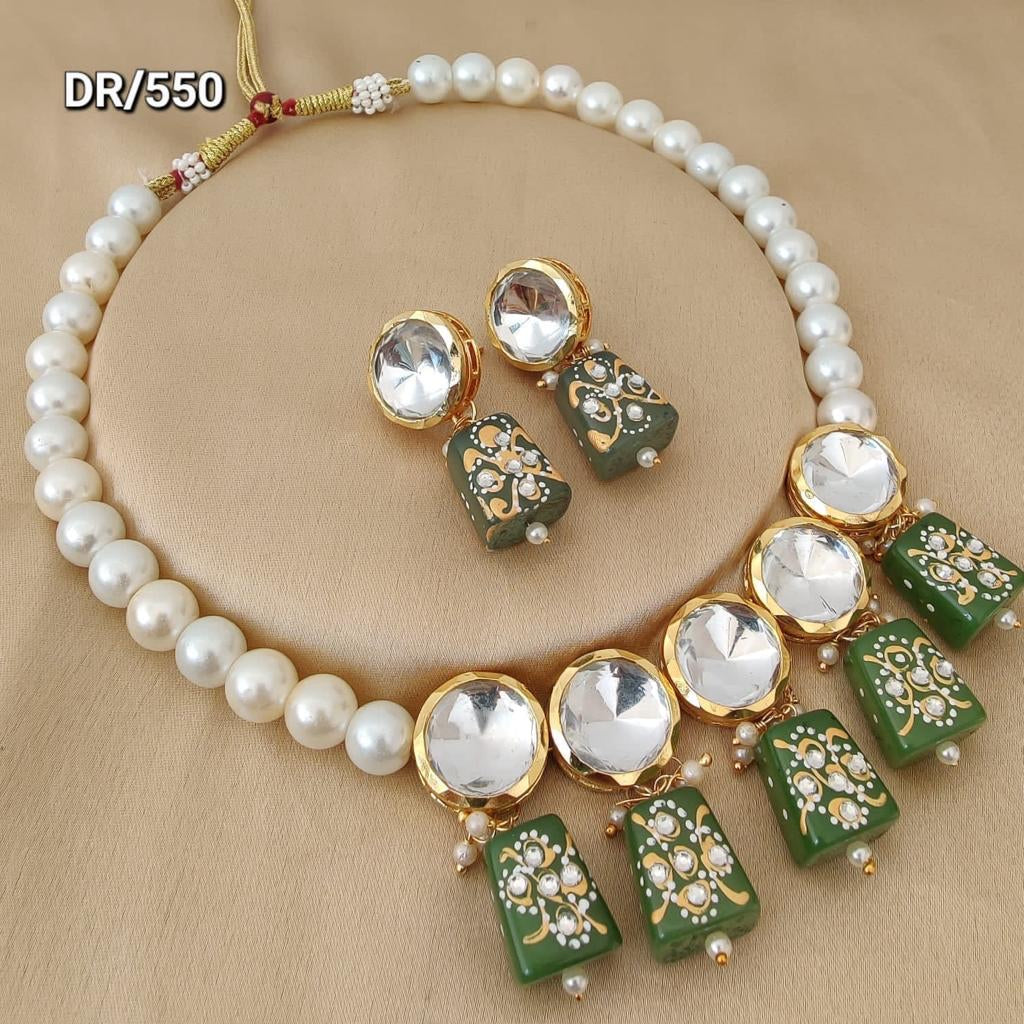 Kundan pearl necklace set in green