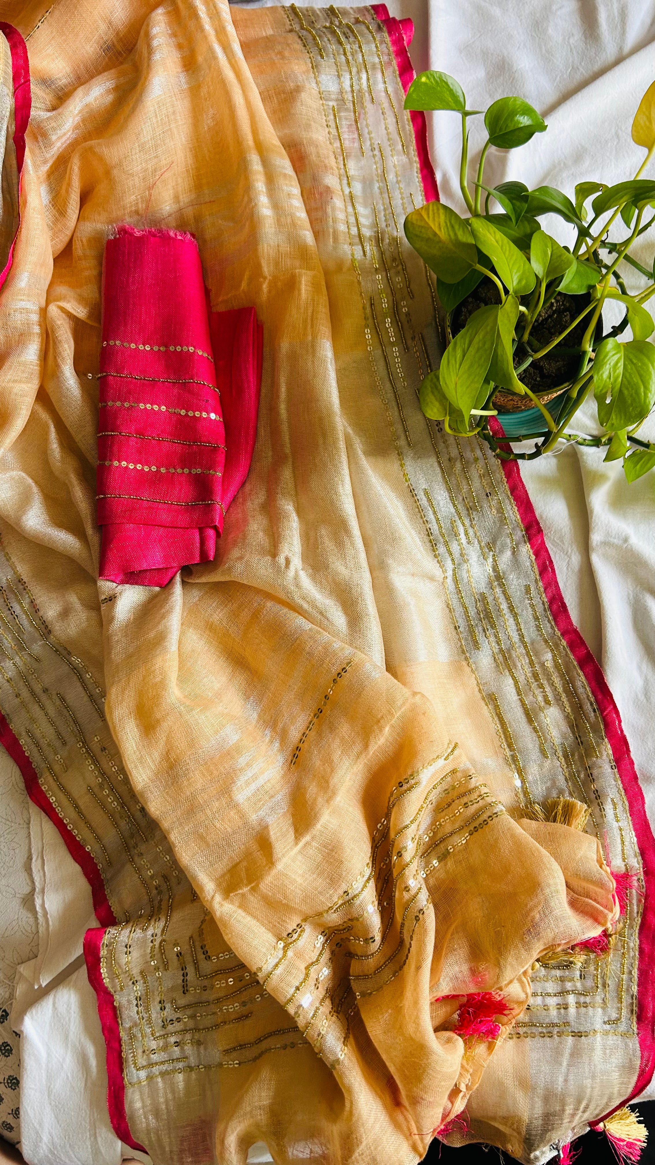 Light Peachish Orange Linen Sequence Embroidered Saree