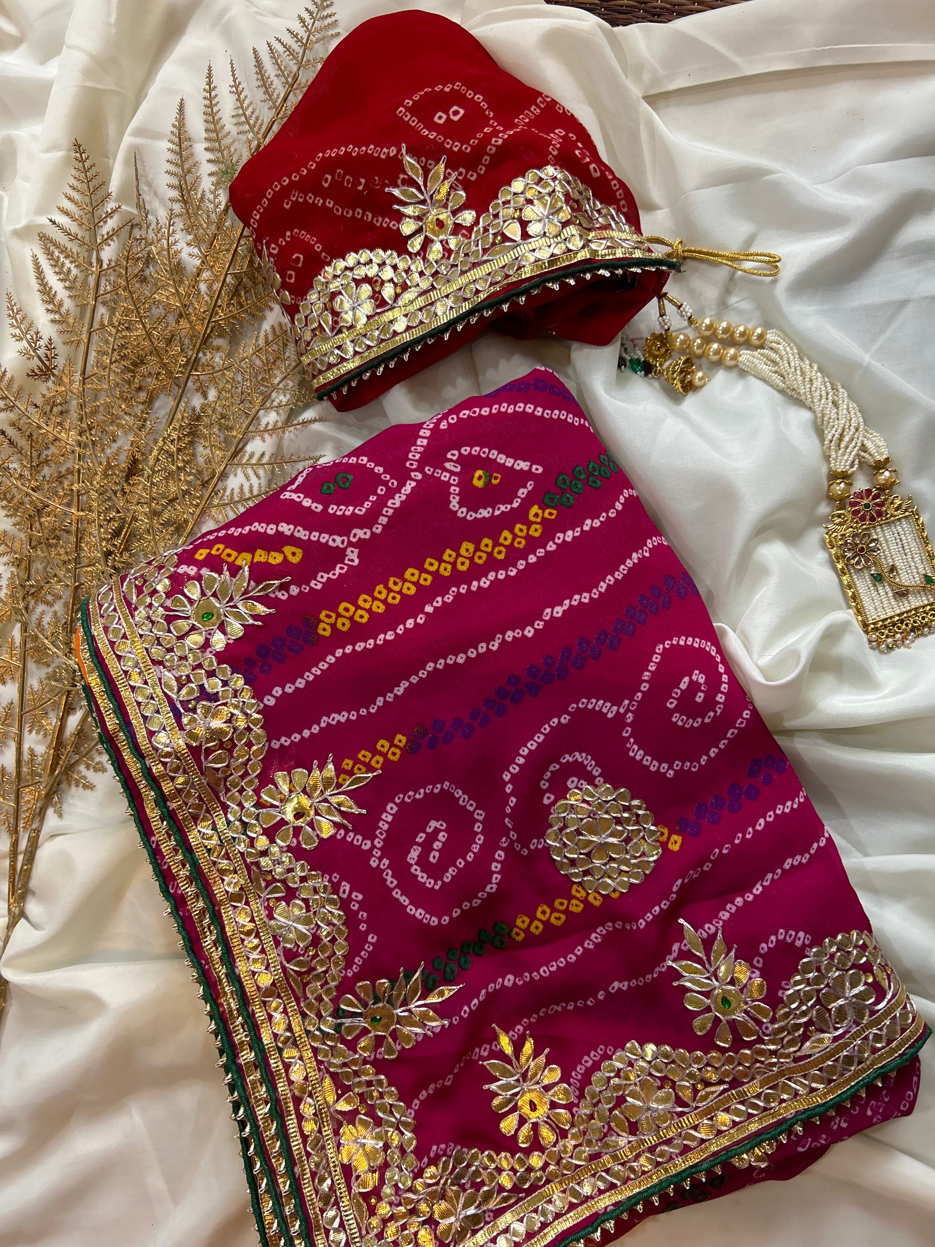 Hote pink bandhej gota patti work saree