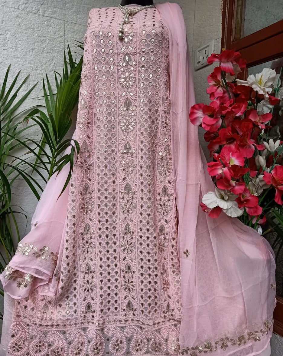 lucknowi dress design Meet MYRA A powder blue graceful front-open georgette 4-piece suit featuring delicate self Chikankari embroidery with subtle katdana work all over. The front-open design gives the outfit a beautiful flow and