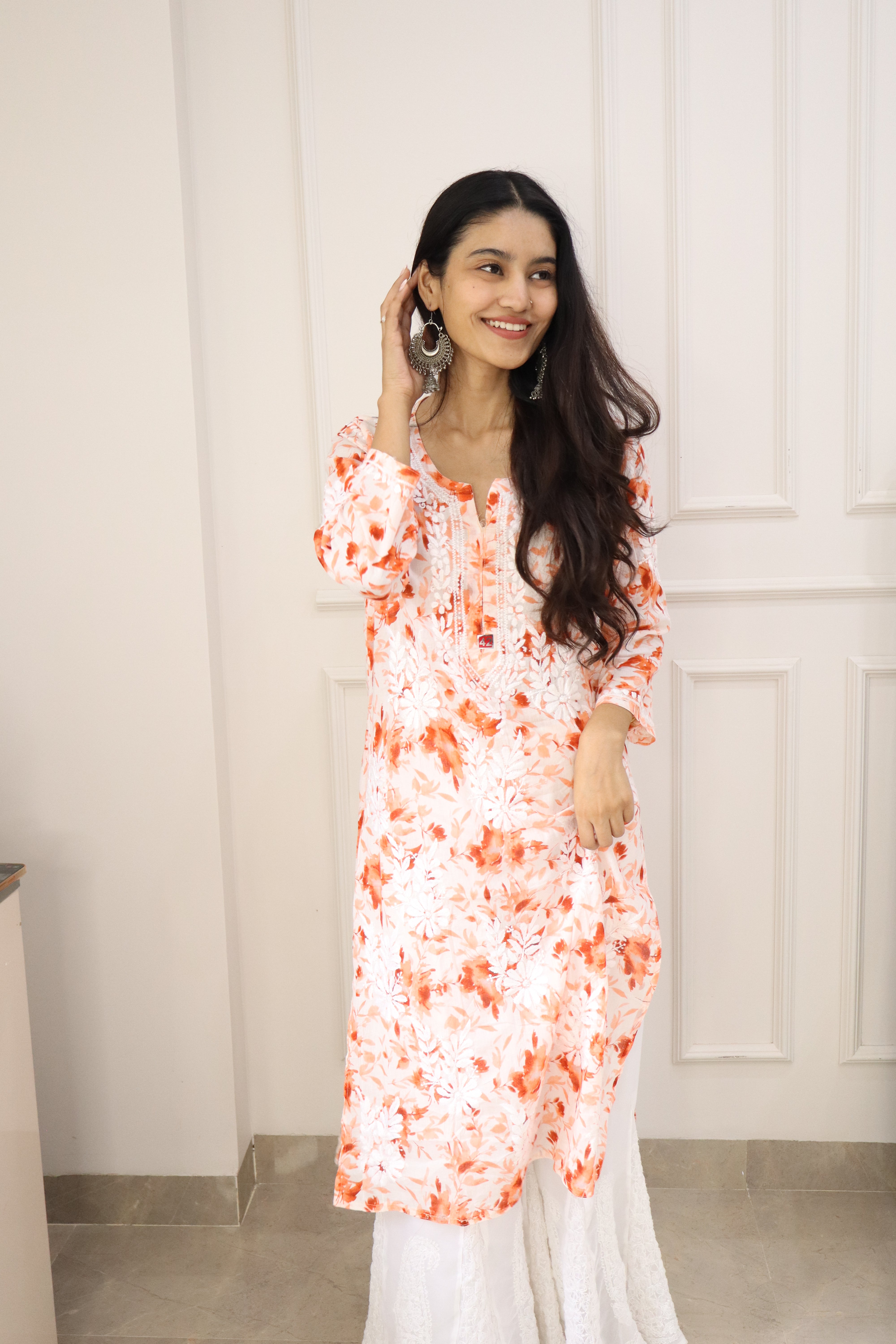 Beautiful Orange Mul mul cotton chikankari kurti