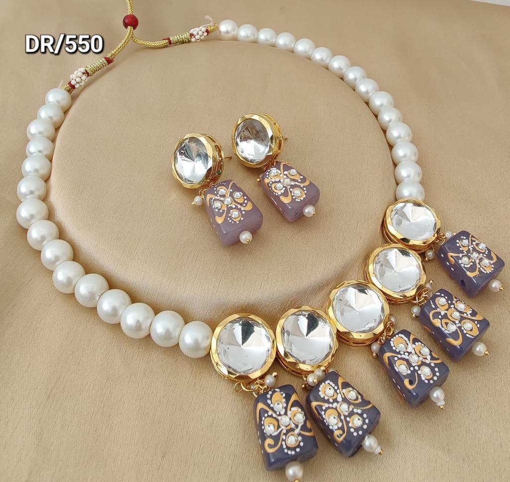 Kundan pearl necklace set in purple