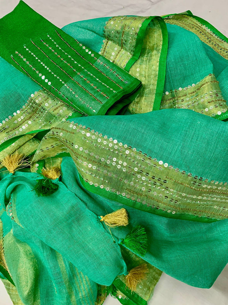 Green And Pink Linen Embroidery Saree
