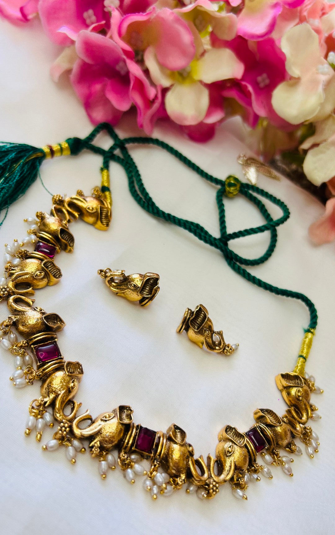 Traditional elephant-themed necklace and earring set