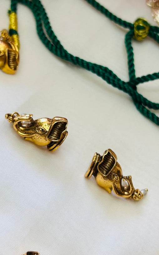 Traditional elephant-themed necklace and earring set