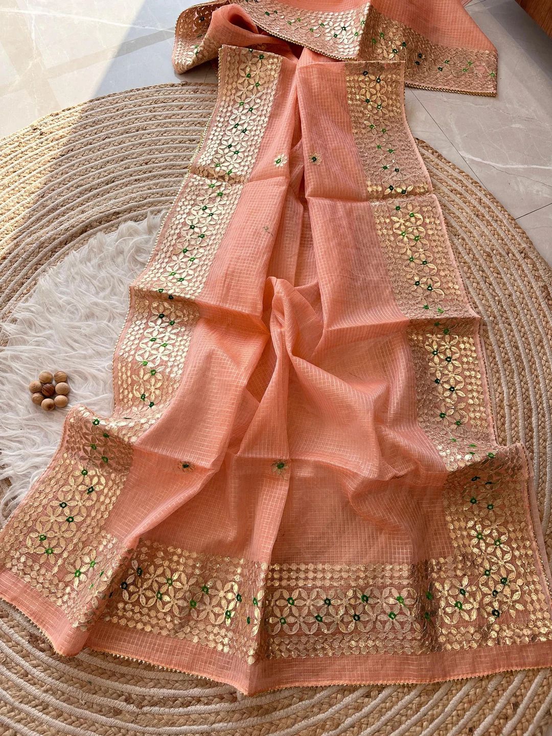 Kumudini- Peach Kota Doria Heavy Border Gota Patti Saree