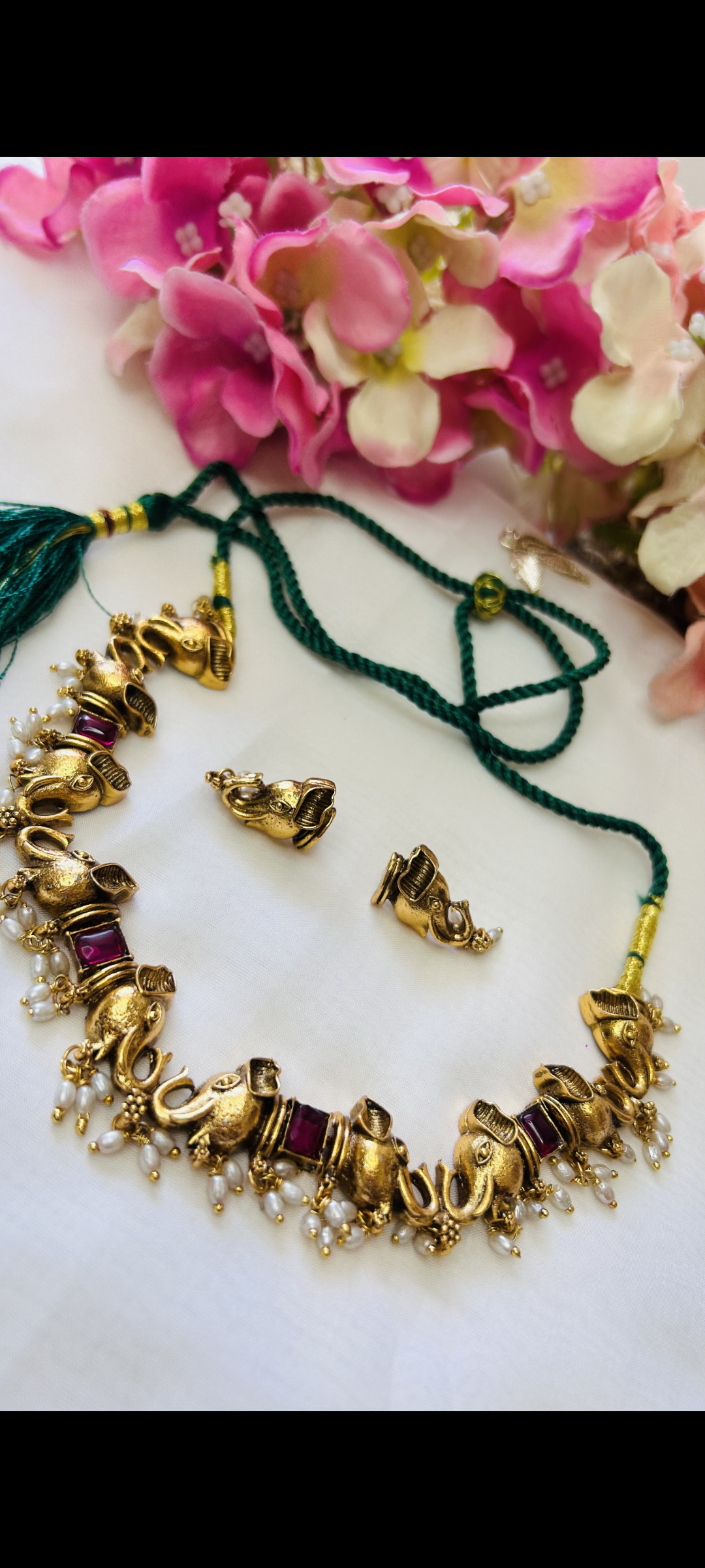 Traditional elephant-themed necklace and earring set