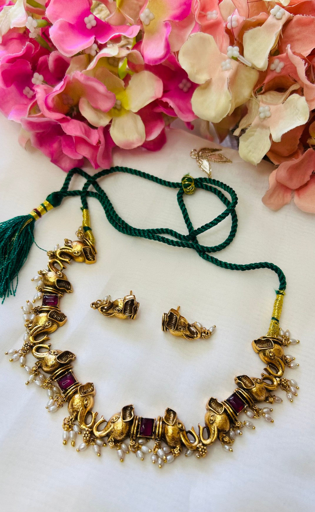 Traditional elephant-themed necklace and earring set
