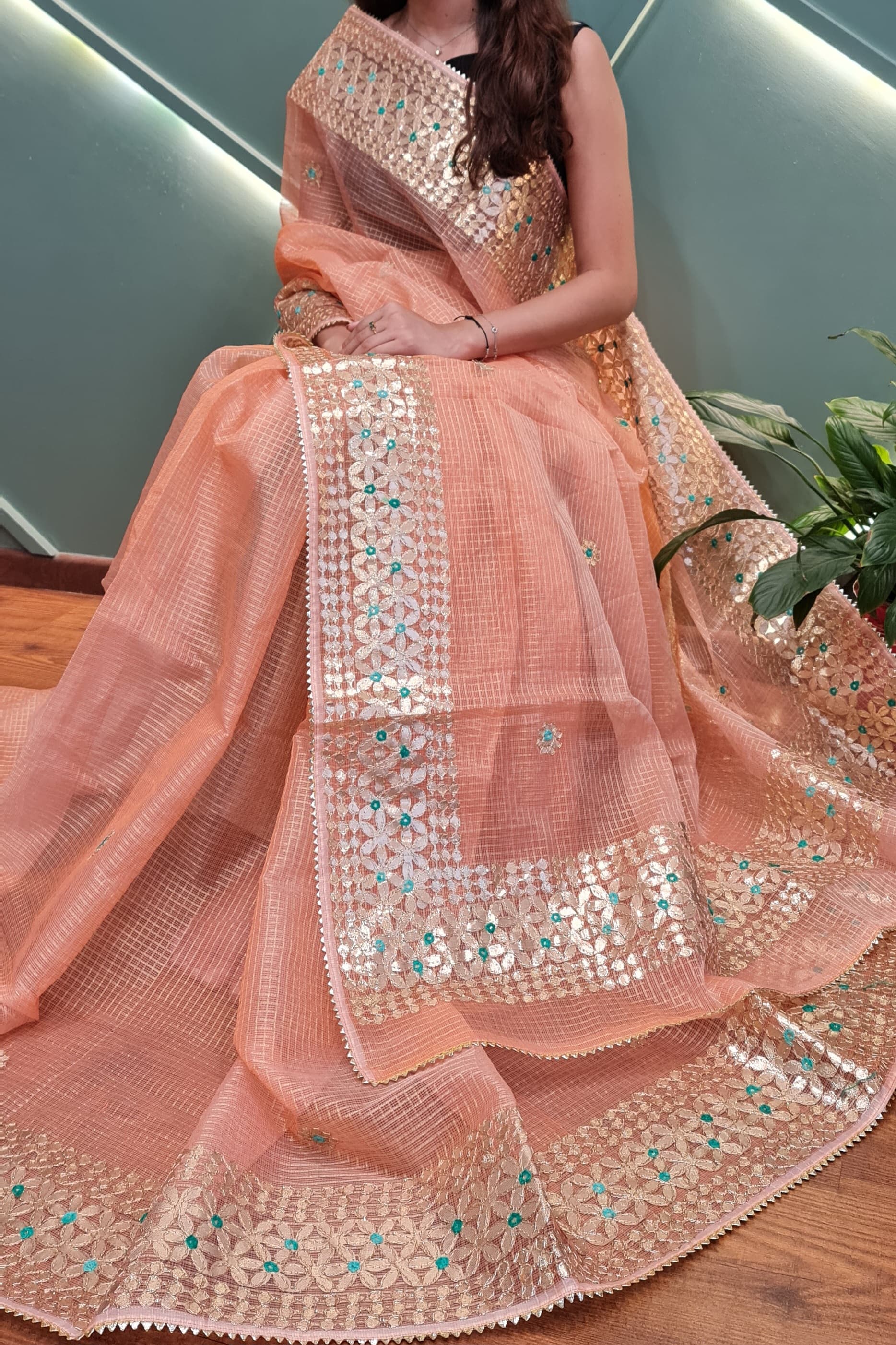 Kumudini- Peach Kota Doria Heavy Border Gota Patti Saree