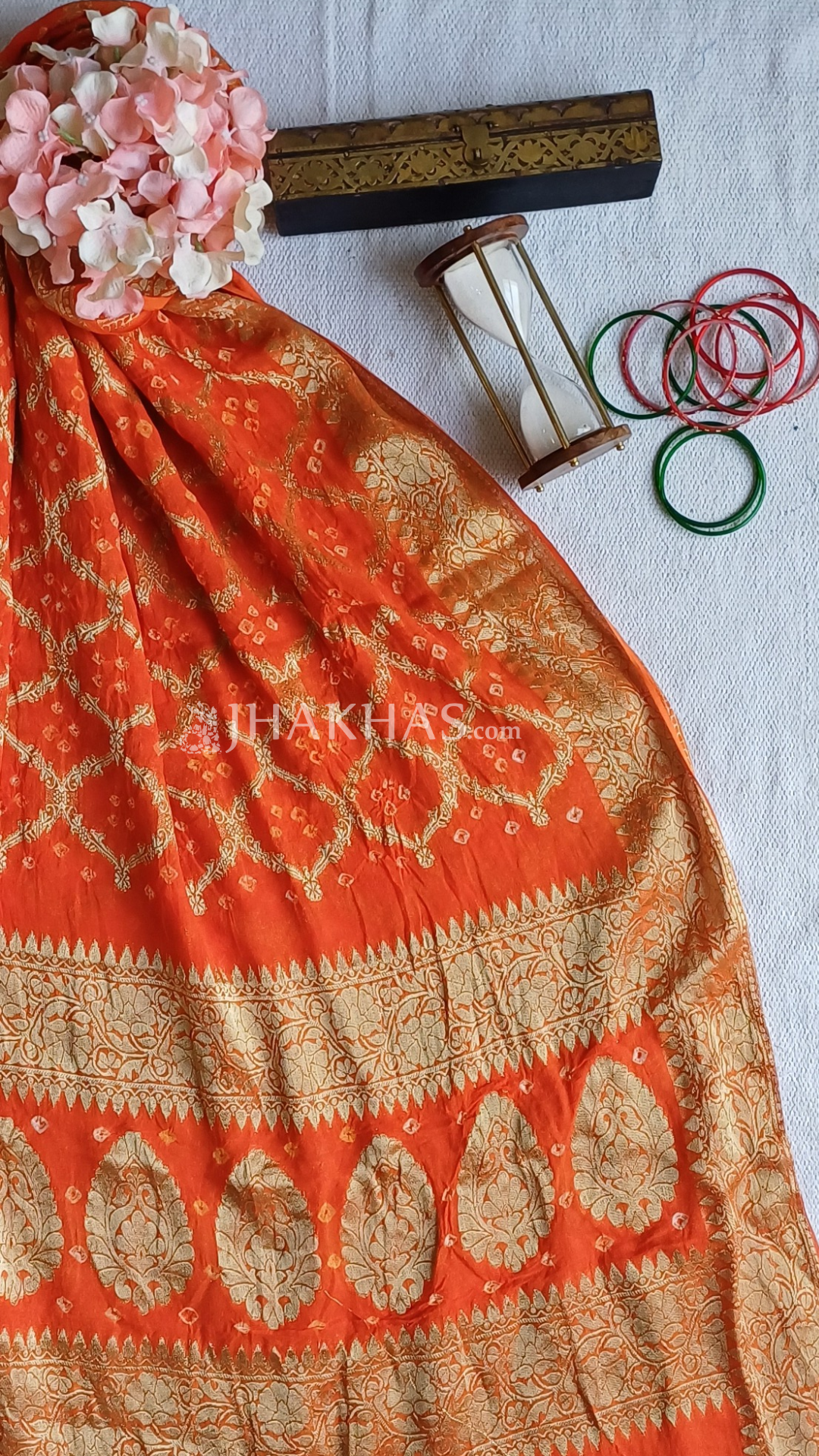 Orange gharchola dupatta with godl zari weave
