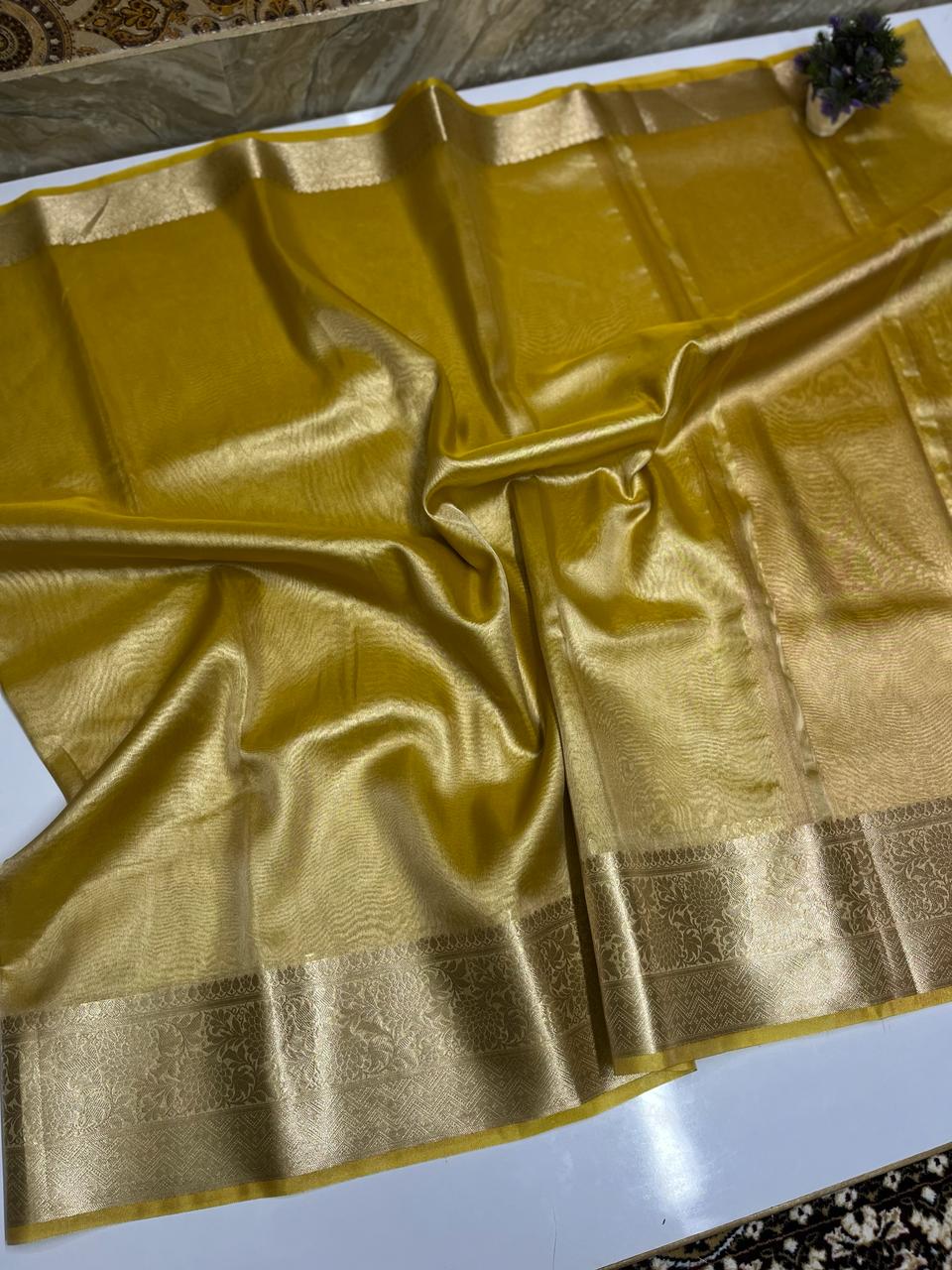 Gold Zari border soft tissue saree shimmer yellow