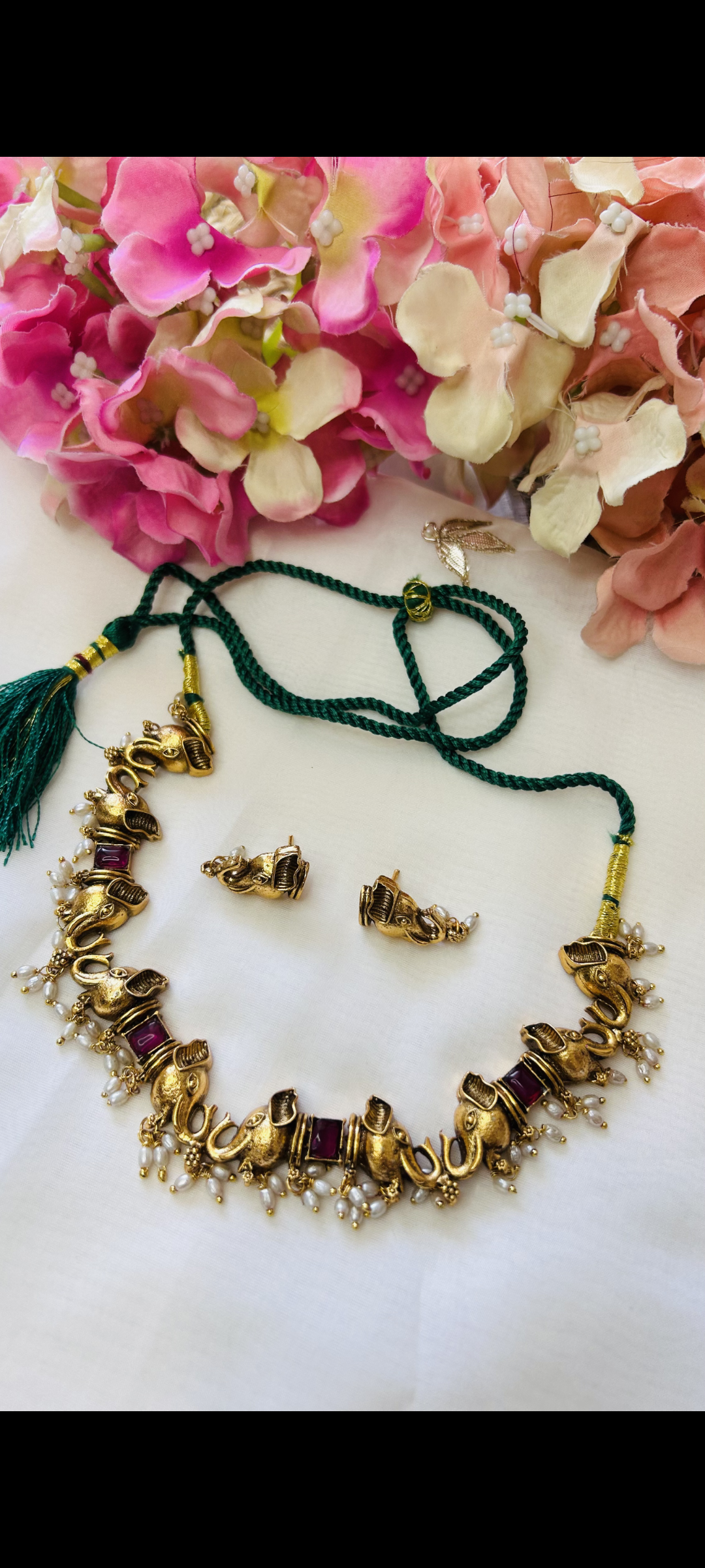 Traditional elephant-themed necklace and earring set