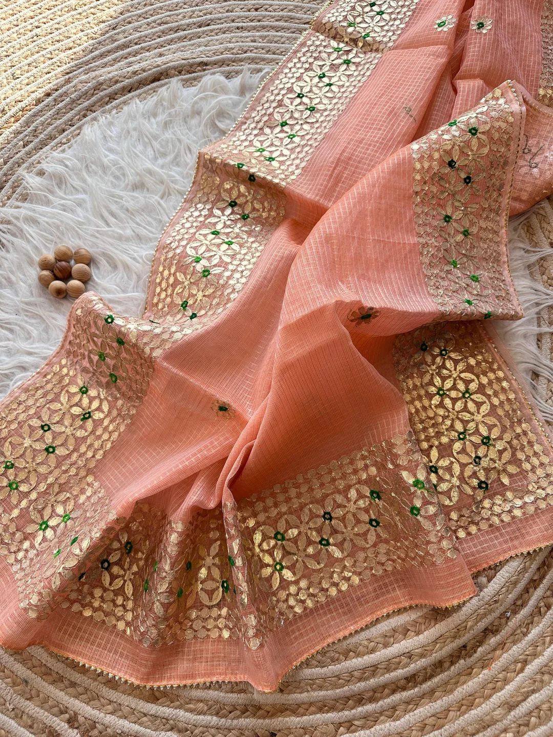 Kumudini- Peach Kota Doria Heavy Border Gota Patti Saree