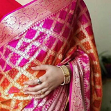 Banarasi Chiffon Bandhani Saree In Orange Rani