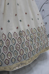 Cream Embroidery And Sequin Semi Stitched Lehenga