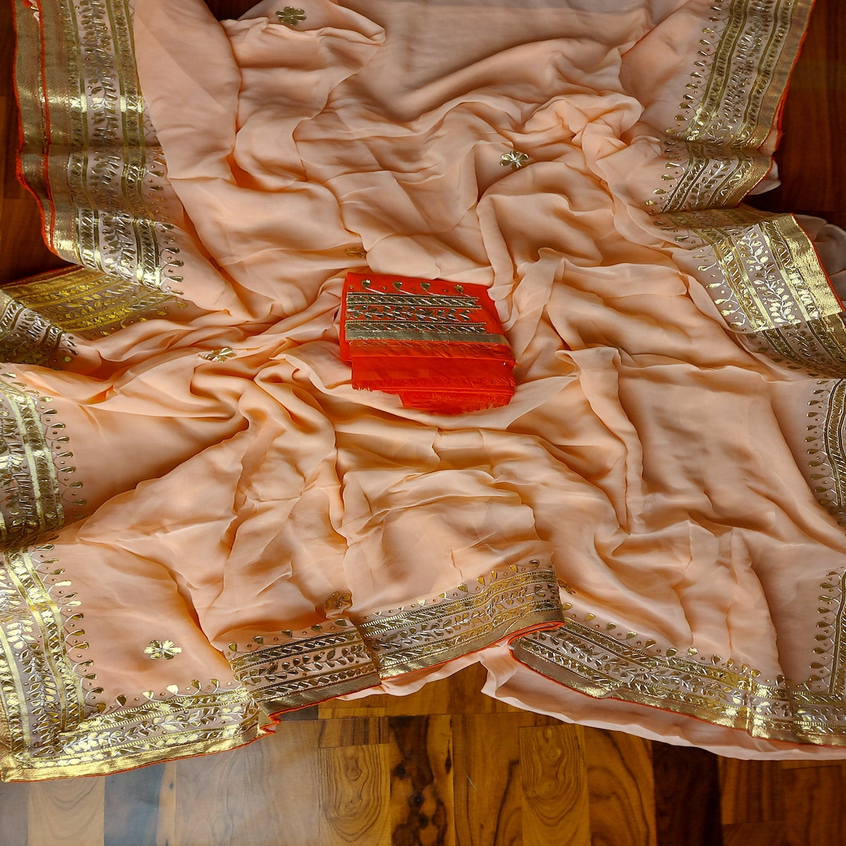 Buy Peach Georgette Realzari Saree Online – Vasansi Jaipur