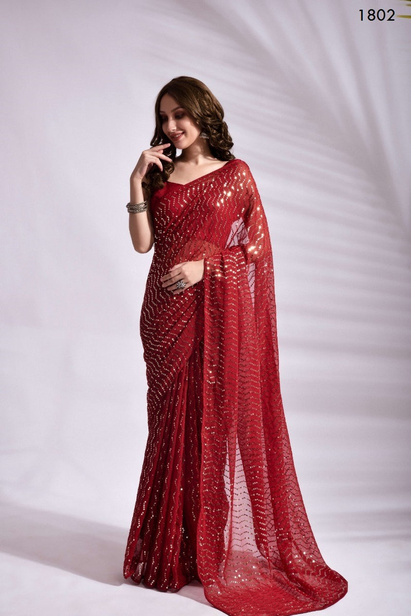 Deep red georgette saree with stone work and antique crushed gota bord